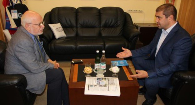 Mikhail Fedotov, the head of the Human Rights Council (HRC) under the Russian president, and Magdi Kamalov, the founder of the weekly newspaper "Chernovik" (Draft), at a meeting on July 5, 2019. Photo by the press service of the HRC http://president-sovet.ru/presscenter/news/read/5635/ Mikhail Fedotov, the head of the Human Rights Council (HRC) under the Russian president, and Magdi Kamalov, the founder of the weekly newspaper "Chernovik" (Draft), at a meeting on July 5, 2019. Photo by the press service of the HRC http://president-sovet.ru/presscenter/news/read/5635/