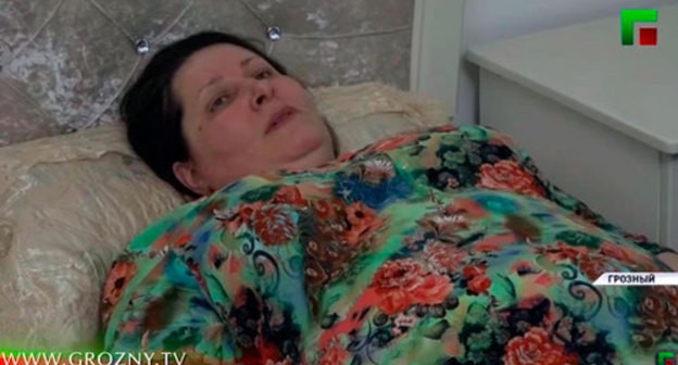 Lizan Isakova gives an interview. Photo: screenshot of the video by the Grozny TV channel https://www.youtube.com/watch?v=_m7SOmYQyFs Lizan Isakova gives an interview. Photo: screenshot of the video by the Grozny TV channel https://www.youtube.com/watch?v=_m7SOmYQyFs