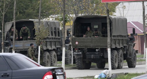 Law enforcers. Photo: REUTERS/Alkhan Gargayev Law enforcers. Photo: REUTERS/Alkhan Gargayev