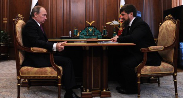 Vladimir Putin and Kamzan Kadyrov. Photo: press service of the Administration of the President of Russia, http://kremlin.ru/events/president/news/51567/photos/43701 Vladimir Putin and Kamzan Kadyrov. Photo: press service of the Administration of the President of Russia, http://kremlin.ru/events/president/news/51567/photos/43701