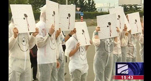 Protest performance at the Georgian Ministry of Internal Affairs, July 17, 2019. Screenshot from 'Rustavi-2' broadcasting: http://rustavi2.ge/en/news/139307 Protest performance at the Georgian Ministry of Internal Affairs, July 17, 2019. Screenshot from 'Rustavi-2' broadcasting: http://rustavi2.ge/en/news/139307