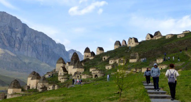 Necropolis near the village of Dargavs, called "City of the dead". Screenshot of the video https://www.youtube.com/watch?v=k6p8Tst2vM0 Necropolis near the village of Dargavs, called "City of the dead". Screenshot of the video https://www.youtube.com/watch?v=k6p8Tst2vM0