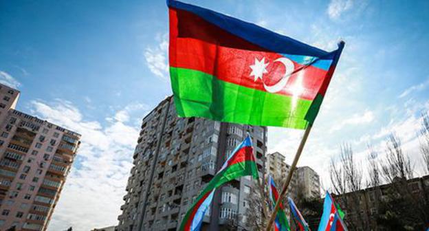 The flag of Azerbaijan. Photo by Aziz Karimov for the "Caucasian Knot" The flag of Azerbaijan. Photo by Aziz Karimov for the "Caucasian Knot"