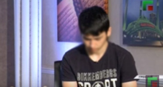 TV report with apologies of a 16-year-old teenager for criticizing the Chechen authorities. Screenshot from 'Grozny' TV Channel video: https://www.youtube.com/watch?v=YzJ9yIq7GYE TV report with apologies of a 16-year-old teenager for criticizing the Chechen authorities. Screenshot from 'Grozny' TV Channel video: https://www.youtube.com/watch?v=YzJ9yIq7GYE