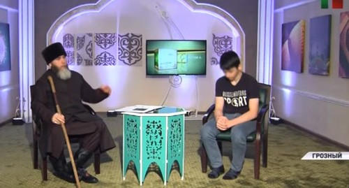 TV report with apologies of a 16-year-old teenager for criticizing the Chechen authorities. Screenshot from 'Grozny' TV Channel video: https://www.youtube.com/watch?v=YzJ9yIq7GYE TV report with apologies of a 16-year-old teenager for criticizing the Chechen authorities. Screenshot from 'Grozny' TV Channel video: https://www.youtube.com/watch?v=YzJ9yIq7GYE
