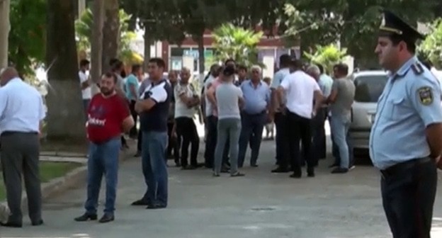 After shooting at a market in the village of Beyuk Kesik. Screenshot from video broadcasting by ‘Mir 24’, http://yandex.ru/efir?from=efir&stream_id45ae5759ad418da29eba6741d1319fb1 After shooting at a market in the village of Beyuk Kesik. Screenshot from video broadcasting by ‘Mir 24’, http://yandex.ru/efir?from=efir&stream_id45ae5759ad418da29eba6741d1319fb1