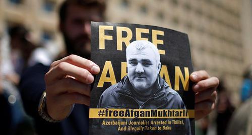 A poster with Afghan Mukhtarly's photo. Photo: REUTERS/David Mdzinarishvili A poster with Afghan Mukhtarly's photo. Photo: REUTERS/David Mdzinarishvili