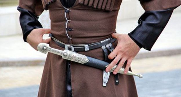 Chechen traditional dress with a dagger. Photo by Magomed Magomedov for the "Caucasian Knot" Chechen traditional dress with a dagger. Photo by Magomed Magomedov for the "Caucasian Knot"