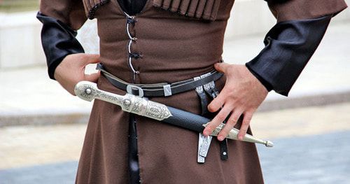 Chechen traditional dress with a dagger. Photo by Magomed Magomedov for the "Caucasian Knot" Chechen traditional dress with a dagger. Photo by Magomed Magomedov for the "Caucasian Knot"