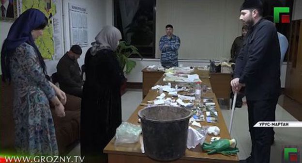 A woman is accused of witchcraft at the meeting with Adam Elzhurkaev, chief physician of the Islamic Medicine Centre in Grozny. Screenshot from video posted by 'Grozny' TV Channel: https://www.youtube.com/watch?v=pWIsYVfKLmY A woman is accused of witchcraft at the meeting with Adam Elzhurkaev, chief physician of the Islamic Medicine Centre in Grozny. Screenshot from video posted by 'Grozny' TV Channel: https://www.youtube.com/watch?v=pWIsYVfKLmY