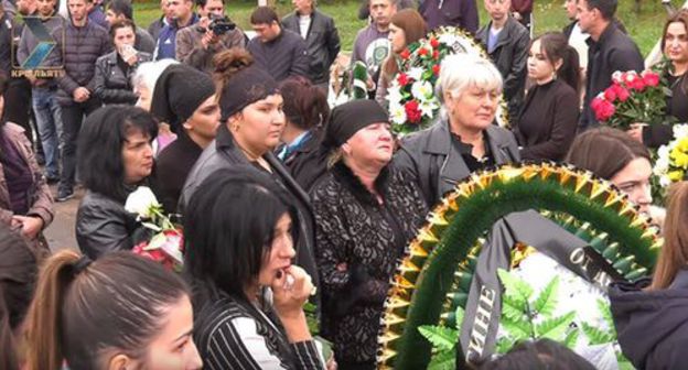 Regina Gagieva's funeral. September 27, 2019. Screenshot of the video by КРЫЛЬЯ TV https://www.youtube.com/watch?v=KJ34Byd7H9k Regina Gagieva's funeral. September 27, 2019. Screenshot of the video by КРЫЛЬЯ TV https://www.youtube.com/watch?v=KJ34Byd7H9k