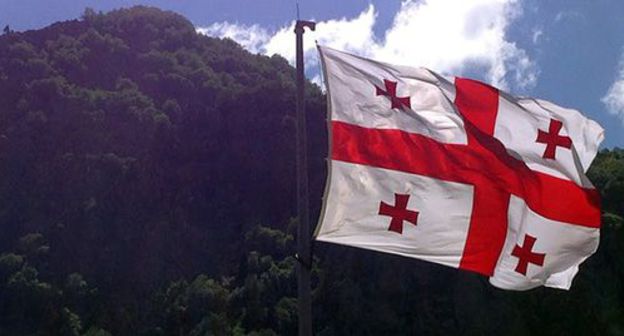 Flag of Georgia. Photo by Akhmed Aldebirov for the Caucasian Knot Flag of Georgia. Photo by Akhmed Aldebirov for the Caucasian Knot