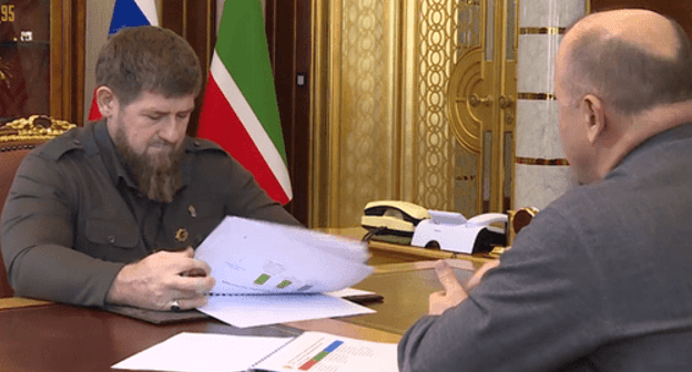 Taimaskhanov presents his report to Kadyrov. Screenshot of the video on Ramzan Kadyrov's page on VKontakte
https://vk.com/wall279938622_450357?reply=450448 Taimaskhanov presents his report to Kadyrov. Screenshot of the video on Ramzan Kadyrov's page on VKontakte
https://vk.com/wall279938622_450357?reply=450448