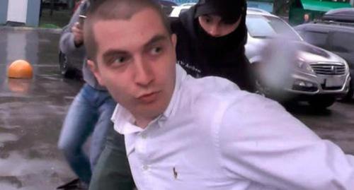 Georgy Guev's detention. Photo: screenshot of the video by TASS https://www.youtube.com/watch?v=yYQEb5nf0Iw&feature=youtu.be Georgy Guev's detention. Photo: screenshot of the video by TASS https://www.youtube.com/watch?v=yYQEb5nf0Iw&feature=youtu.be