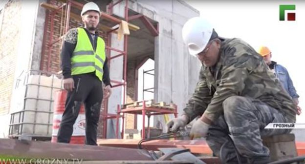 Screenshot from video report "Are non-Chechens building Chechnya?" posted by "Grozny" TV Channel at: https://www.youtube.com/channel/UC3FPh5_CUUx99KCqDE09kWQ Screenshot from video report "Are non-Chechens building Chechnya?" posted by "Grozny" TV Channel at: https://www.youtube.com/channel/UC3FPh5_CUUx99KCqDE09kWQ