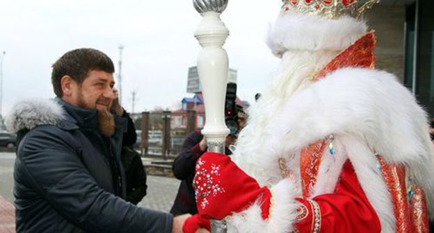 Ramzan Kadyrov (on the left) and Father Frost (Russian Santa Claus). Photo © Lom-Ali Lorsanov/Grozny Inform news agency Ramzan Kadyrov (on the left) and Father Frost (Russian Santa Claus). Photo © Lom-Ali Lorsanov/Grozny Inform news agency