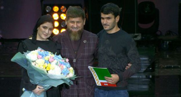 Suleimanov brother and sister receive keys from a new apartmeny in Grozny. Photo by the press service of the Akhmat Kadyrov Fund Suleimanov brother and sister receive keys from a new apartmeny in Grozny. Photo by the press service of the Akhmat Kadyrov Fund