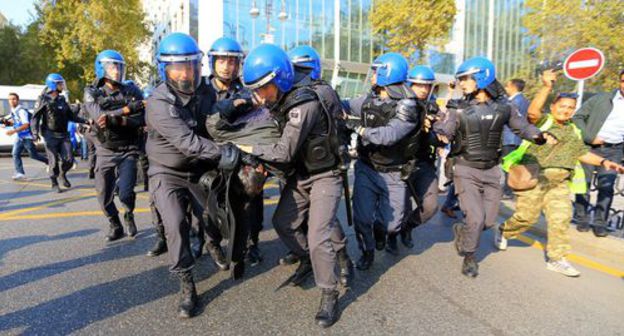 The police detains an activist at a protest action. Photo by Aziz Karimov for the "Caucasian Knot" The police detains an activist at a protest action. Photo by Aziz Karimov for the "Caucasian Knot"