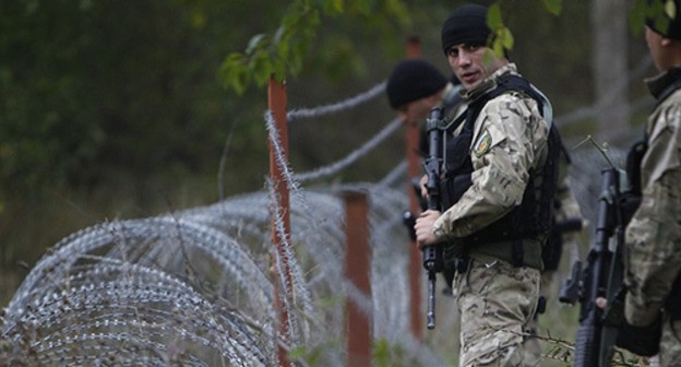 Georgian border guards. Photo: REUTERS/David Mdzinarishvili Georgian border guards. Photo: REUTERS/David Mdzinarishvili