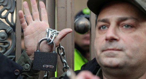A police officer in Georgia. Photo: REUTERS/Irakli Gedenidze A police officer in Georgia. Photo: REUTERS/Irakli Gedenidze