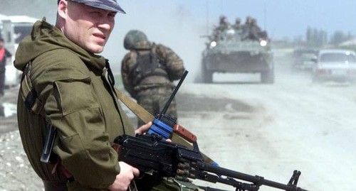 A Russian soldier at a check point 7 km away from Grozny. Photo: REUTERS/Viktor Korotaev A Russian soldier at a check point 7 km away from Grozny. Photo: REUTERS/Viktor Korotaev