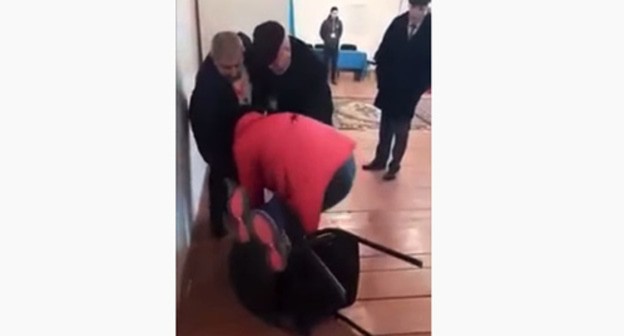 A woman using force against Zhalya Bairamova at a polling station during the parliamentary elections. Screenshot from video "Ibad Bayramov" posted at: https://www.youtube.com/watch?v=aZkgGtKwicU#action=share A woman using force against Zhalya Bairamova at a polling station during the parliamentary elections. Screenshot from video "Ibad Bayramov" posted at: https://www.youtube.com/watch?v=aZkgGtKwicU#action=share