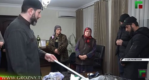 Adam Elzhurkaev talks to the detained women and their sons. Screenshot of the video by the Grozny TV Channel https://www.youtube.com/watch?v=ziKQdQCjkqA" Adam Elzhurkaev talks to the detained women and their sons. Screenshot of the video by the Grozny TV Channel https://www.youtube.com/watch?v=ziKQdQCjkqA"
