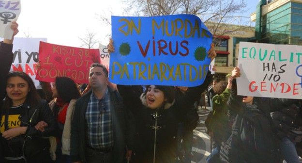 A poster saying, "Patriarchy is the most disgusting virus". Photo by Aziz Karimov for the "Caucasian Knot" A poster saying, "Patriarchy is the most disgusting virus". Photo by Aziz Karimov for the "Caucasian Knot"