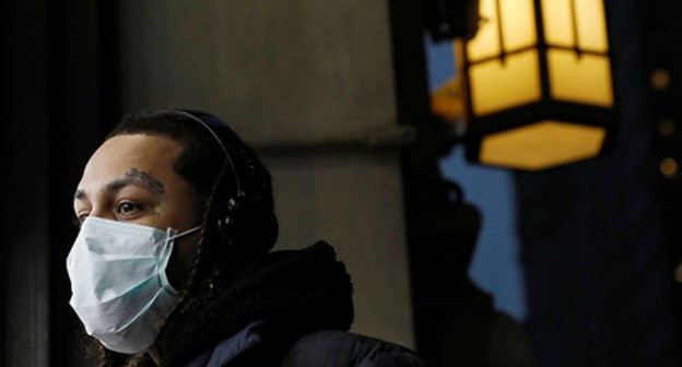 A person wearing a medical mask. Photo: REUTERS/Andrew Kelly A person wearing a medical mask. Photo: REUTERS/Andrew Kelly