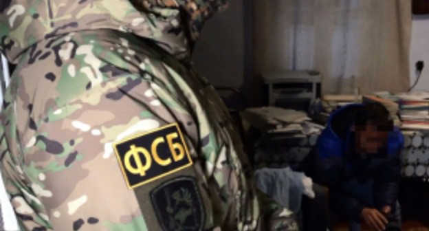The Russia's FSB (Federal Security Bureau) officer. Photo by the press service of the Russian National Antiterrorist Committee (NAC) The Russia's FSB (Federal Security Bureau) officer. Photo by the press service of the Russian National Antiterrorist Committee (NAC)