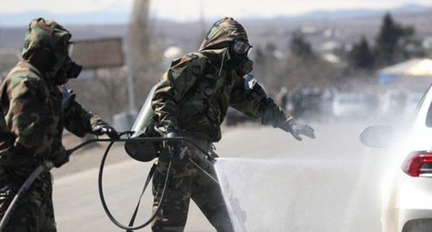 Disinfection in Marneuli, Georgia, March 25, 2020. Photo: REUTERS/Irakli Gedenidze Disinfection in Marneuli, Georgia, March 25, 2020. Photo: REUTERS/Irakli Gedenidze