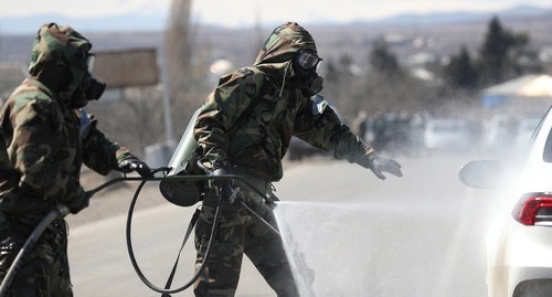 Disinfection in Marneuli, Georgia, March 25, 2020. Photo: REUTERS/Irakli Gedenidze Disinfection in Marneuli, Georgia, March 25, 2020. Photo: REUTERS/Irakli Gedenidze
