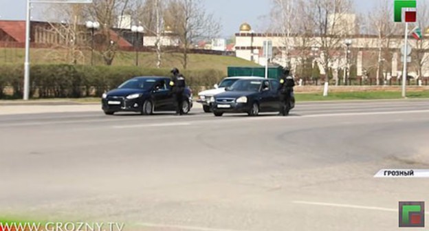 Law enforcers in Grozny. Screenshot of the video by the Grozny TV channel https://www.youtube.com/watch?v=Dq-Sv8HPfjo Law enforcers in Grozny. Screenshot of the video by the Grozny TV channel https://www.youtube.com/watch?v=Dq-Sv8HPfjo
