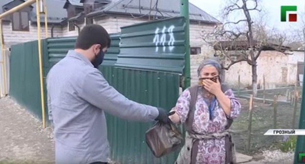 Delivery of bread to resdidents of Grozny. Screenshot of the video by the Grozny TV channel https://www.youtube.com/watch?time_continue=11&v=izbztOOQ5Yk&feature=emb_logo Delivery of bread to resdidents of Grozny. Screenshot of the video by the Grozny TV channel https://www.youtube.com/watch?time_continue=11&v=izbztOOQ5Yk&feature=emb_logo