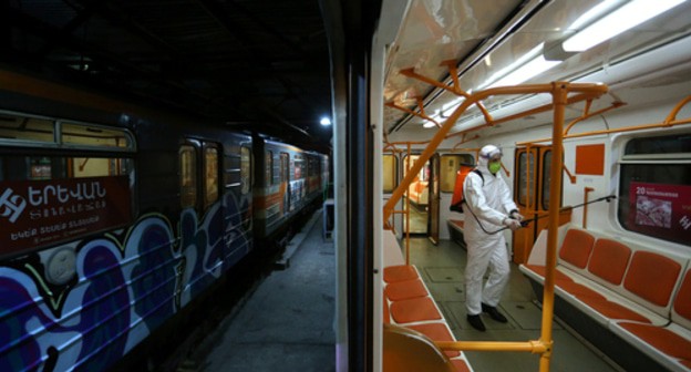 Worker conducts disinfection in Yerevan metro. Photo: Vahram Baghdasaryan/ REUTERS Worker conducts disinfection in Yerevan metro. Photo: Vahram Baghdasaryan/ REUTERS