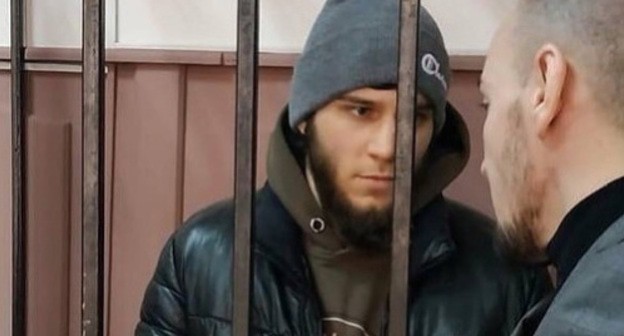 Alibek Mirzekhanov in the courtroom. Screenshot of Alibek Mirzekhanov's Instagram post: https://www.instagram.com/p/B_kIPAOIl92/ Alibek Mirzekhanov in the courtroom. Screenshot of Alibek Mirzekhanov's Instagram post: https://www.instagram.com/p/B_kIPAOIl92/