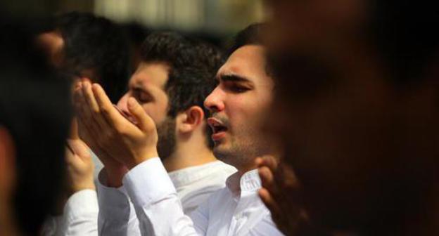 Prayer. Photo by Aziz Karimov for the Caucasian Knot Prayer. Photo by Aziz Karimov for the Caucasian Knot