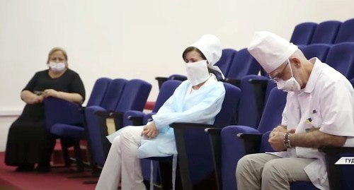 The doctors of the Gudermes Central District Hospital (CDH) listen to Magomed Daudov who reproaches them. Screenshot of the video by the Grozny TV channel https://www.youtube.com/watch?v=WFi3V0ywwr4&feature=youtu.be&t=1039 The doctors of the Gudermes Central District Hospital (CDH) listen to Magomed Daudov who reproaches them. Screenshot of the video by the Grozny TV channel https://www.youtube.com/watch?v=WFi3V0ywwr4&feature=youtu.be&t=1039