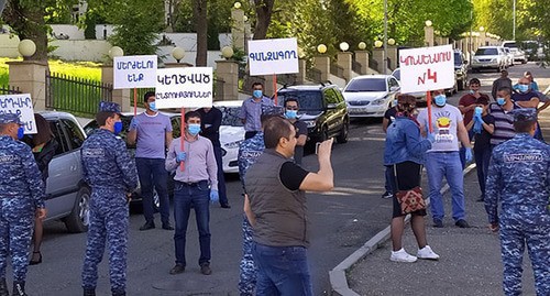 A protest rally near the Culture Center in Shushi during the inauguration of Araik Arutyunyan, the new President of the Nagorno-Karabakh Republic. Photo by Alvard Grigoryan for the "Caucasian Knot" A protest rally near the Culture Center in Shushi during the inauguration of Araik Arutyunyan, the new President of the Nagorno-Karabakh Republic. Photo by Alvard Grigoryan for the "Caucasian Knot"