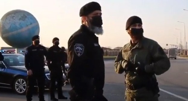 Law enforcers in Chechnya. Screenshot of the video at the Telegram Videos channel https://www.youtube.com/watch?v=qy0BMTNv3c0 Law enforcers in Chechnya. Screenshot of the video at the Telegram Videos channel https://www.youtube.com/watch?v=qy0BMTNv3c0