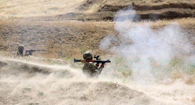 A soldier of the Azerbaijani army. Photo by the press service of the Ministry of Defence of Azerbaijan https://mod.gov.az/az/news/en-yaxsi-motoatici-boluk-adi-ugrunda-yaris-kecirilir-video-31141.html A soldier of the Azerbaijani army. Photo by the press service of the Ministry of Defence of Azerbaijan https://mod.gov.az/az/news/en-yaxsi-motoatici-boluk-adi-ugrunda-yaris-kecirilir-video-31141.html