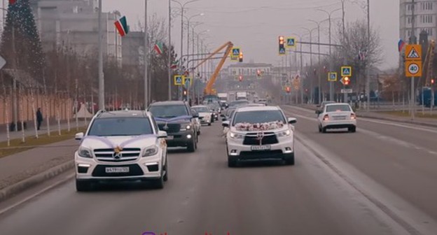 A wedding cortege in Chechnya. Screenshot of the video https://www.youtube.com/watch?v=vq01MTjUfGs A wedding cortege in Chechnya. Screenshot of the video https://www.youtube.com/watch?v=vq01MTjUfGs