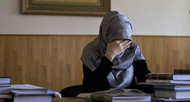 A woman. Photo: REUTERS/Maxim Shemetov A woman. Photo: REUTERS/Maxim Shemetov