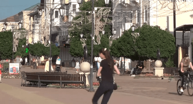 Passers-by in Cherkessk. Screenshot from 'Arkhyz 24' TV Channel broadcasting: https://www.youtube.com/watch?v=XnsjNbz8nzw Passers-by in Cherkessk. Screenshot from 'Arkhyz 24' TV Channel broadcasting: https://www.youtube.com/watch?v=XnsjNbz8nzw