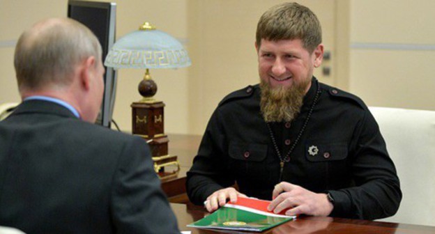 Ramzan Kadyrov and Vladimir Putin. Photo by the Kremlin's press service http://kremlin.ru/events/president/news/57797 Ramzan Kadyrov and Vladimir Putin. Photo by the Kremlin's press service http://kremlin.ru/events/president/news/57797