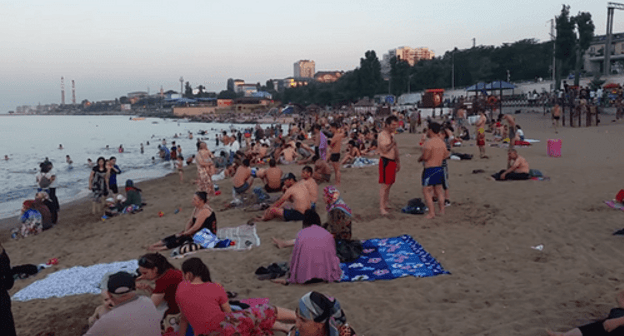 Beach visitors in Makhachkala. Screenshot of the video by "Byuro Perevodov" https://www.youtube.com/watch?v=VHiui7lZNkM Beach visitors in Makhachkala. Screenshot of the video by "Byuro Perevodov" https://www.youtube.com/watch?v=VHiui7lZNkM
