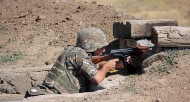 A soldier. Photo by the press service of the Armenian Ministry of Defence, http://www.mil.am/ru/news/8097 A soldier. Photo by the press service of the Armenian Ministry of Defence, http://www.mil.am/ru/news/8097