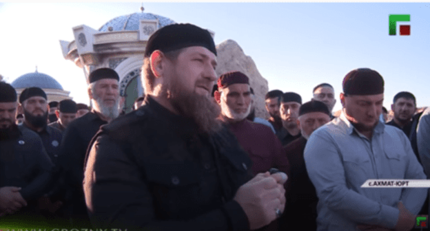 Ramzan Kadyrov (in the center) visits his father's grave during Kurban Bayram. Photo: screenshot of the video https://youtu.be/HnpxY906fA8 Ramzan Kadyrov (in the center) visits his father's grave during Kurban Bayram. Photo: screenshot of the video https://youtu.be/HnpxY906fA8