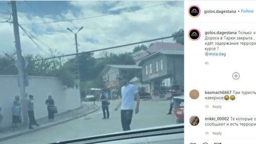 A road blocked by law enforcers near the Mount Tarki-Tau. Screenshot of the video https://www.instagram.com/p/CD50BOaImjg/ A road blocked by law enforcers near the Mount Tarki-Tau. Screenshot of the video https://www.instagram.com/p/CD50BOaImjg/