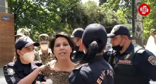 Vafa Nagi is being detained by police. Screenshot: https://www.youtube.com/watch?v=FXexK2bMlRc Vafa Nagi is being detained by police. Screenshot: https://www.youtube.com/watch?v=FXexK2bMlRc